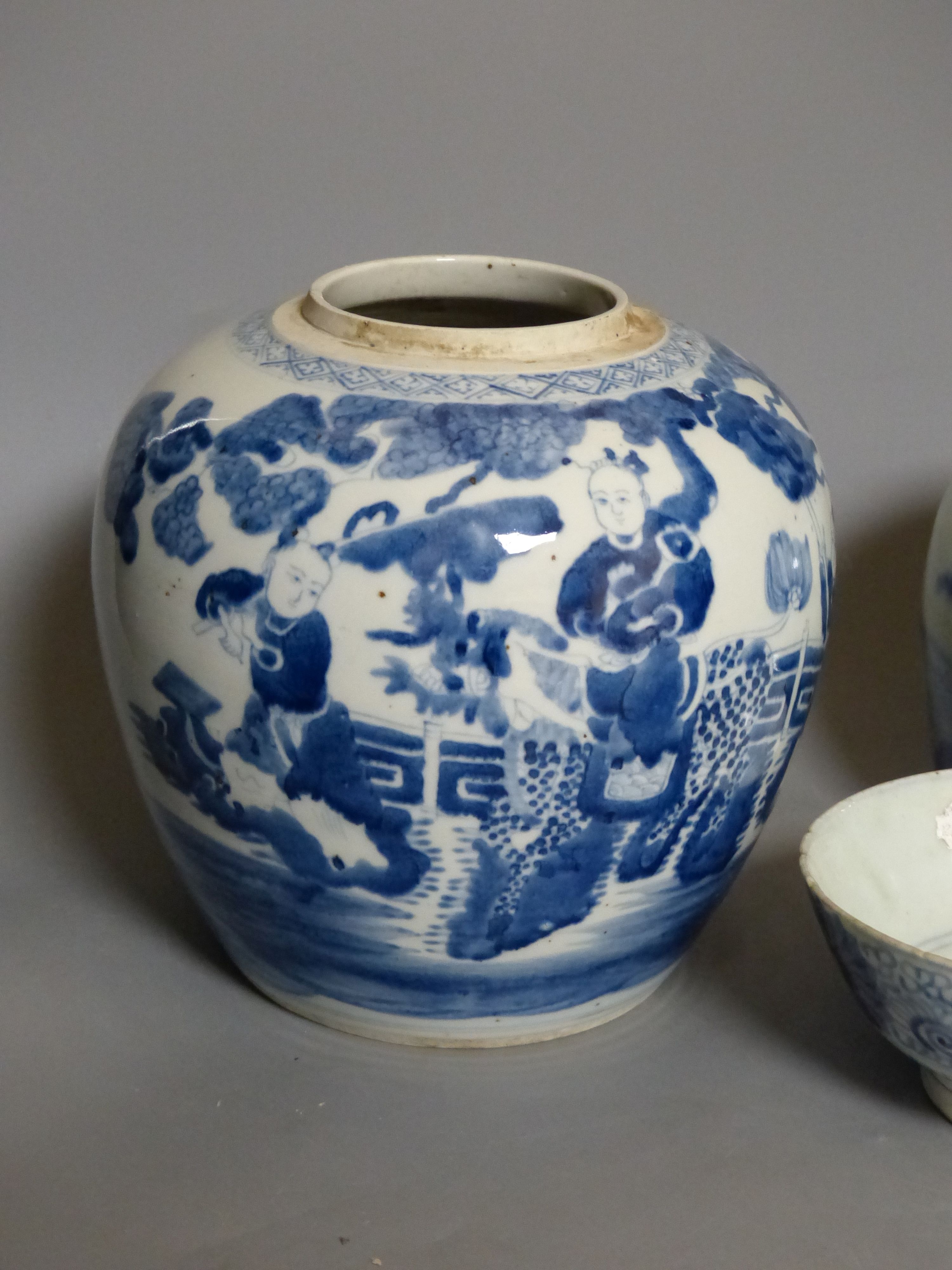 A Chinese blue and white jar, a smaller jar and a bowl, tallest 21cm